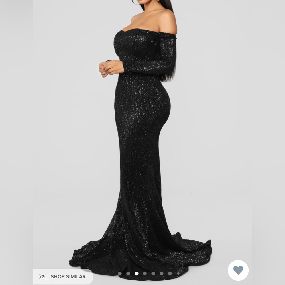 NEVER WORN. STILL IN PACKAGE. BLACK HALTER SEQUIN DRESS